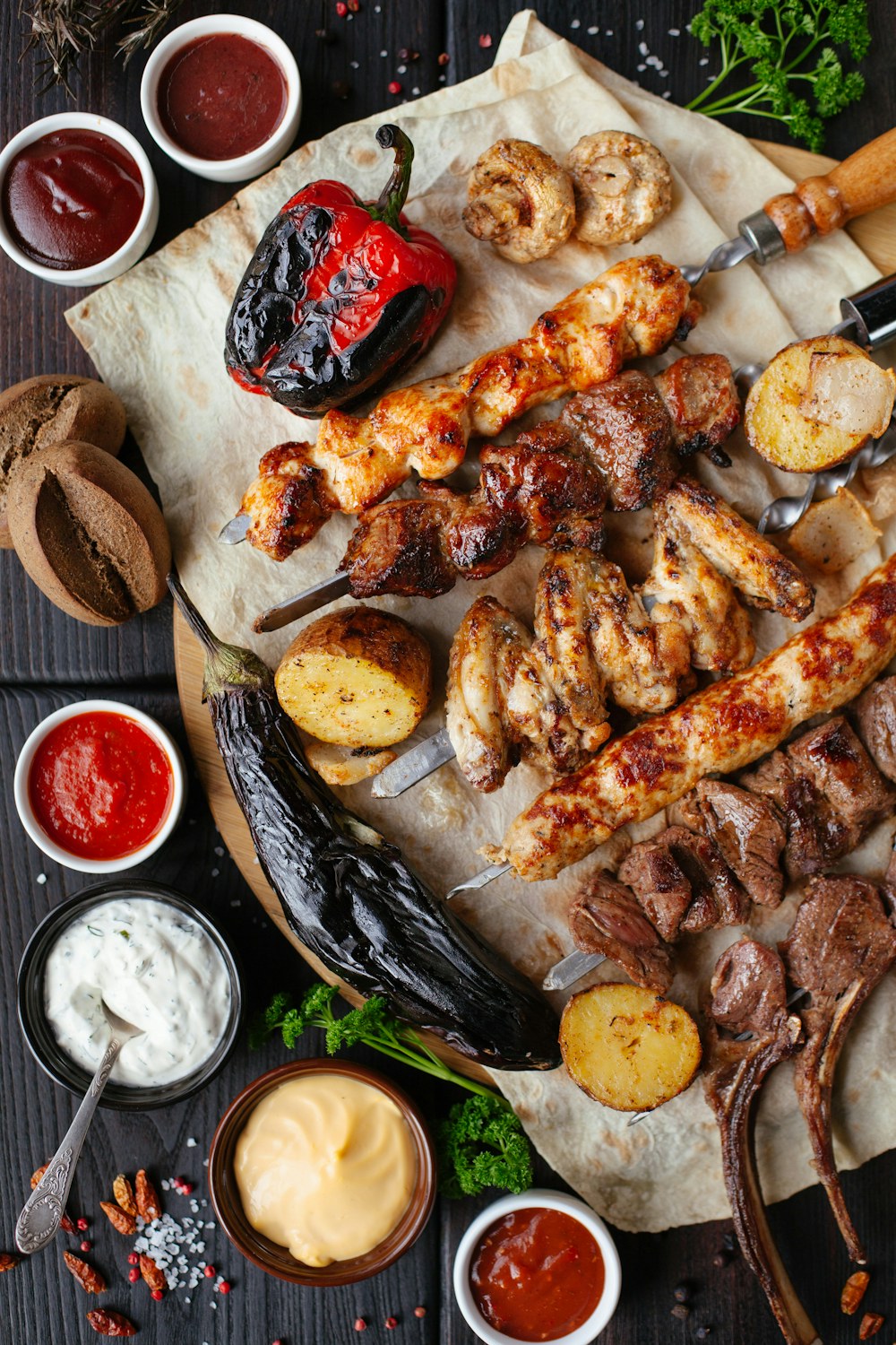 Food cooking over an open charcoal grill